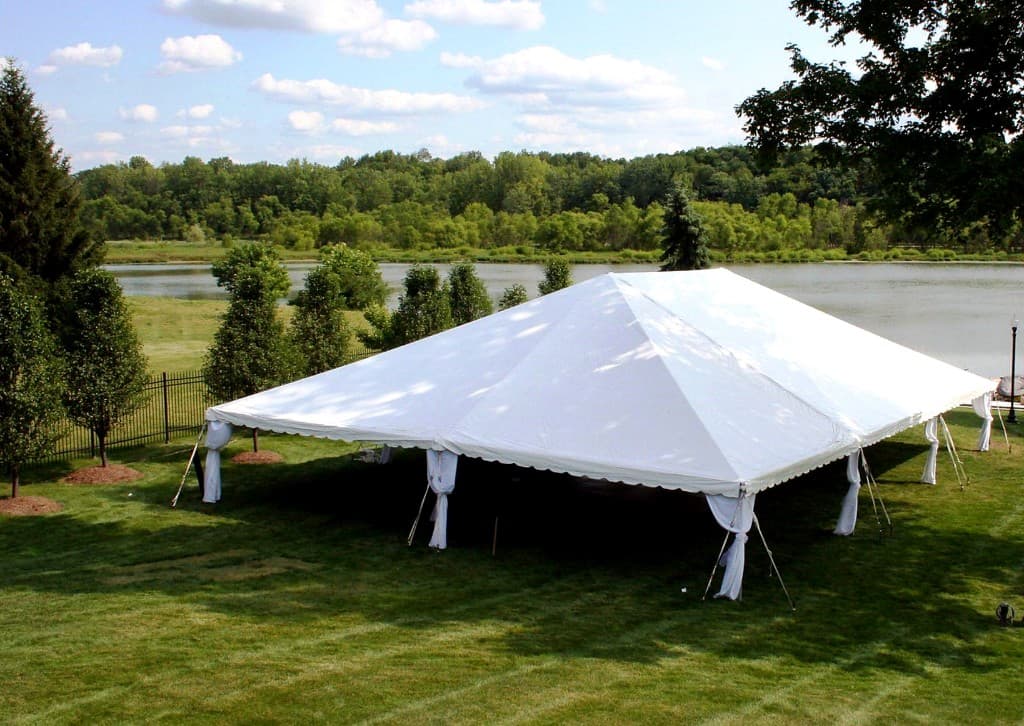 Farmington, CT lakeside event tent setup with open sides and scenic waterfront views