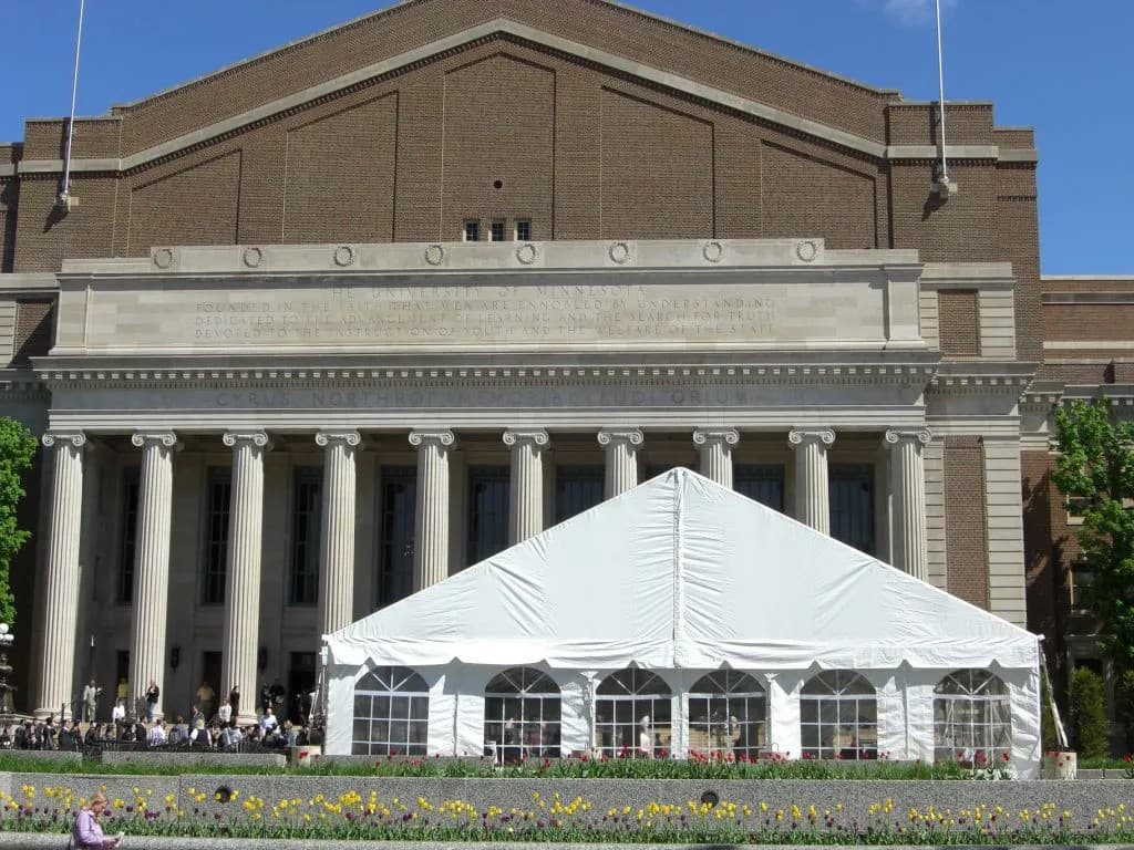 White Navitrac-style frame tent on grass for a Connecticut outdoor event